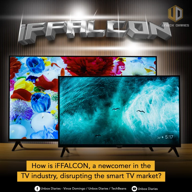 A promotional image for iFFALCON. In the foreground, two iFFALCON smart TVs of different sizes are displayed side-by-side. The larger TV shows a vibrant image of colorful flowers, and the smaller TV displays an image of ocean waves with birds and a time/temperature overlay. Above the TVs, a silver 3D 'iFFALCON' logo is present, with 'UNBOX DIARIES' in the top right corner. A question at the bottom reads: 'How is iFFALCON, a newcomer in the TV industry, disrupting the smart TV market?' Social media handles are listed below.