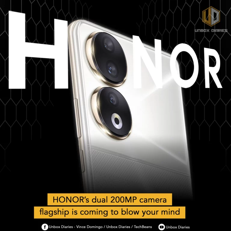 A close-up promotional image of a white or light-colored HONOR smartphone, seen from the upper back corner, with a large "HONOR" logo in white overlaying the top left. The phone features two prominent, vertically stacked circular camera modules with gold rings. The background is dark with a subtle geometric pattern, and the "Unbox Diaries" logo is in the top right corner. A yellow banner at the bottom reads, "HONOR's dual 200MP camera flagship is coming to blow your mind." Social media handles are at the very bottom.