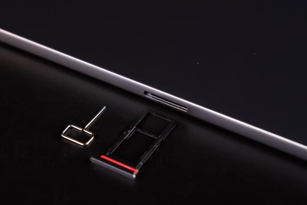 infinix xpad 20's sim ejector tool and sim slot.
