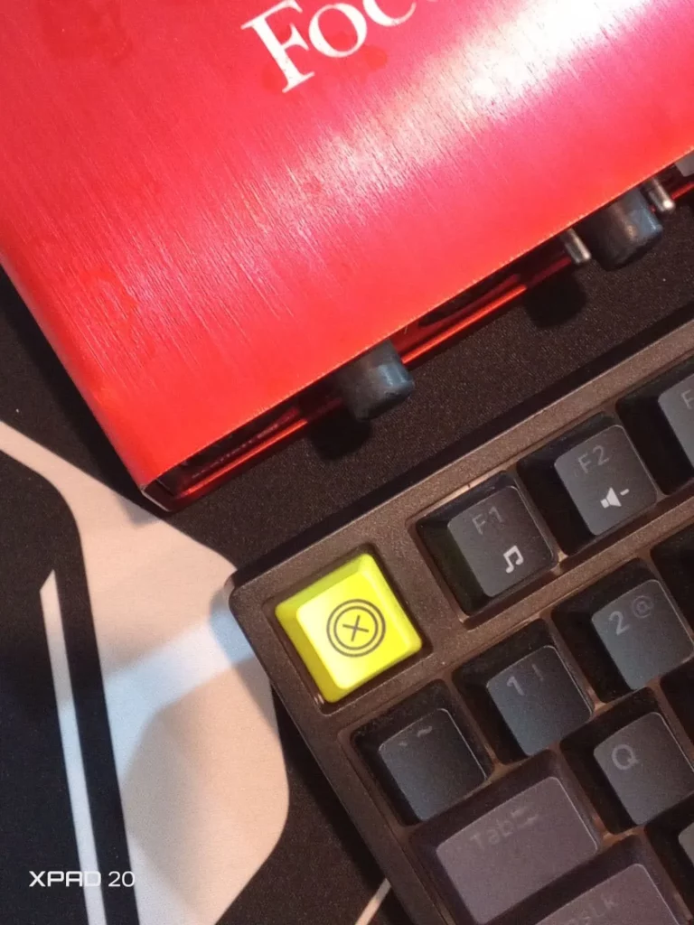 infinix xpad 20's camera shot of focusrite audio equipment and keyboard.
