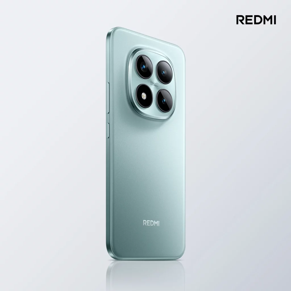A three-quarter view of the Redmi Note 15 Pro+ in a mint green color, showing the back panel and the prominent circular camera module. The phone is slightly angled to reveal its design.