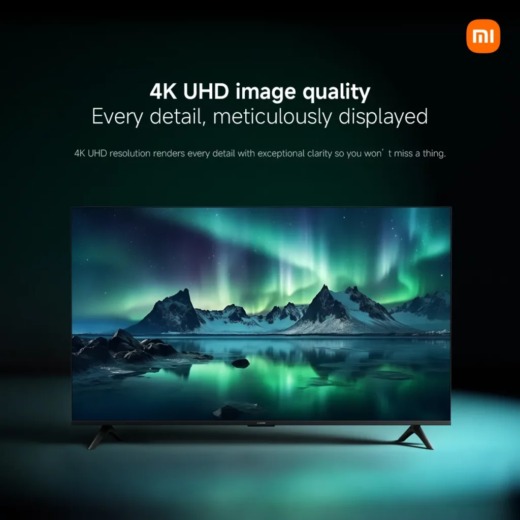 A visual demonstrating the 4K UHD image quality of a Xiaomi TV, with a stunning Northern Lights scene on the screen and the text "4K UHD image quality. Every detail, meticulously displayed."