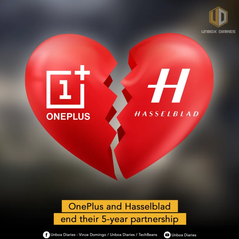 An image showing a large, red heart broken in two, with the OnePlus logo on the left half and the Hasselblad logo on the right half. The background is a dark, out-of-focus gray. A yellow banner at the bottom reads "OnePlus and Hasselblad end their 5-year partnership." The Unbox Diaries logo is in the top right corner, and social media handles are listed at the very bottom.