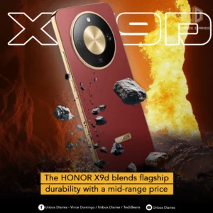 An advertisement for the HONOR X9d smartphone. The image shows the phone from the back, featuring a reddish, textured finish with a gold-colored frame and a large, circular gold camera module. The phone is placed on a rocky, brown landscape with a fiery, swirling vortex in the background. Several dark rocks are shown floating around the phone. The words "X9d" are in large, white, stylized letters at the top right. A yellow banner at the bottom reads, "The HONOR X9d blends flagship durability with a mid-range price."
