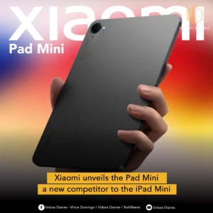 An advertisement for the new Xiaomi Pad Mini. The image features a hand holding a dark-colored tablet with a single camera lens on the back. The background is a vibrant red, orange, and white gradient. The words "xiaomi Pad Mini" are in large, bold letters at the top left. A yellow banner at the bottom reads, "Xiaomi unveils the Pad Mini a new competitor to the iPad Mini."