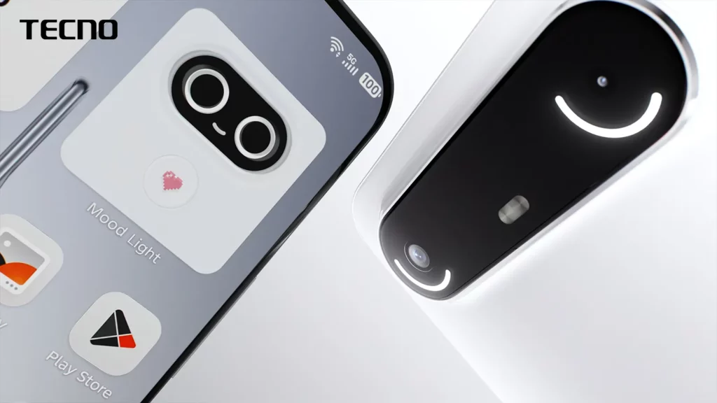 A close-up shot showing the back of a TECNO smartphone with a smiling, light-up camera module. The phone's screen is visible on the left, displaying app icons and a battery life indicator.