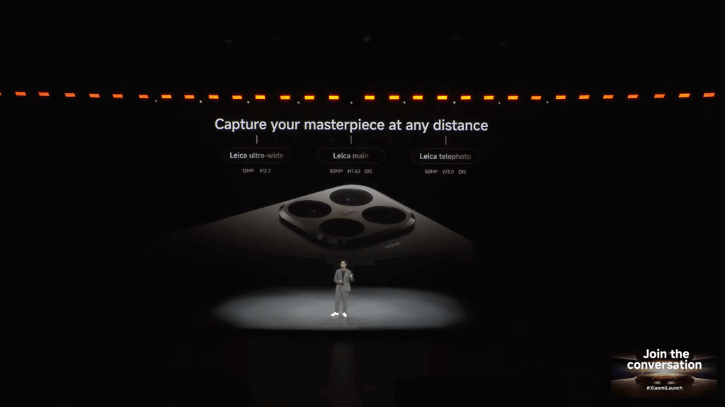 A stage slide detailing the Leica triple camera system specifications for the new phone series. The cameras are listed as: Leica ultra-wide (12MP, f/2.2), Leica main (50MP, f/1.62, OIS), and Leica telephoto (50MP, f/2.0, OIS). The text reads, "Capture your masterpiece at any distance."