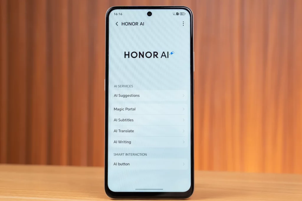 A smartphone screen is shown with the "HONOR AI" settings menu. Listed AI services include AI Suggestions, Magic Portal, AI Subtitles, AI Translate, and AI Writing, with an option for the AI button under Smart Interaction.