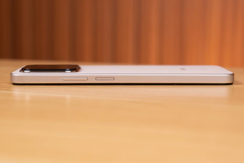 Side profile view of the HONOR X7d smartphone, showing the volume rocker (two buttons) and the power/lock button on the right side.