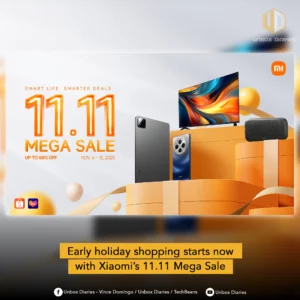 Promotional image for the Xiaomi 11.11 Mega Sale. The light orange scene features a large gift box pedestal displaying various Xiaomi products: a TV, a tablet, a smartphone, and a black speaker. The background is clean and modern with floating spheres. The main text overlay reads: 'SMART LIFE. SMARTER DEALS. 11.11 MEGA SALE, UP TO 68% OFF, NOV. 6 - 15, 2025.' A yellow banner at the bottom contains the caption: 'Early holiday shopping starts now with Xiaomi's 11.11 Mega Sale.' Logos for Unbox Diaries, Shopee, Lazada, and Xiaomi are also visible.