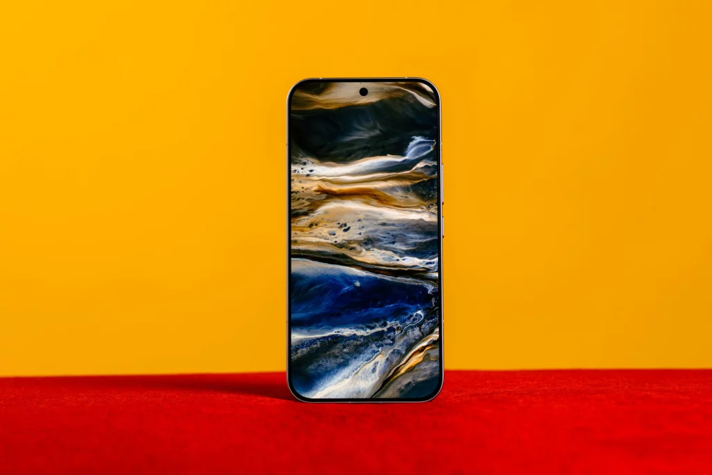 The POCO F8 Ultra phone standing upright, displaying a vibrant, abstract wallpaper with swirls of blue, gold, and white. The phone has slim bezels and a center punch-hole camera.