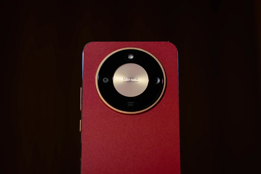 Back angle of the Reddish Brown HONOR X9d 5G with emphasis on the circular camera design.