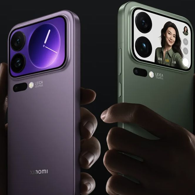 Two Xiaomi smartphones held in hands, showcasing large horizontal rear camera modules that include a secondary display. The purple model on the left displays an analog clock, while the green model on the right shows a video call interface. Both modules feature "Leica" branding.