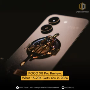 A close-up, dramatic low-light shot of the back of a POCO X8 Pro smartphone. The device features a metallic grey finish and a large, raised Iron Man graphic in the center. The camera module is visible at the top with two large circular lenses. A yellow text box at the bottom reads "POCO X8 Pro Review: What 15-20K Gets You in 2026." The "Unbox Diaries" logo is in the top right corner.