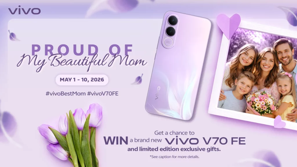 Promotional banner for vivo Philippines Mother’s Day campaign featuring a light purple vivo V70 FE smartphone center-stage. To the left, the text reads "PROUD OF My Beautiful Mom" with the dates "MAY 1 - 10, 2026" and hashtags #vivoBestMom and #vivoV70FE. To the right, a framed family photo shows a mother, father, and three children holding flowers. Purple tulips and floating petals accent the soft lavender background. Bottom text invites users to "Get a chance to WIN a brand new vivo V70 FE and limited edition exclusive gifts."