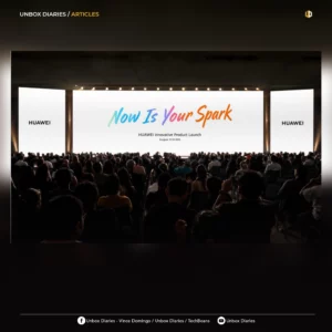 A wide-angle shot of a large audience seated in a dark venue, looking toward a bright three-panel stage display. The central screen features the colorful text "Now Is Your Spark" for the HUAWEI Innovative Product Launch held in Bangkok on May 7, 2026. The flanking screens both display the HUAWEI logo in black text.