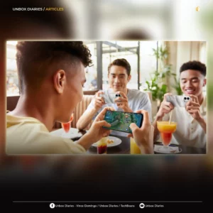 A stylized social media or article header image featuring the same group of men playing mobile games on their OPPO A6s 5G phones, with "Unbox Diaries / Articles" text in the corner.