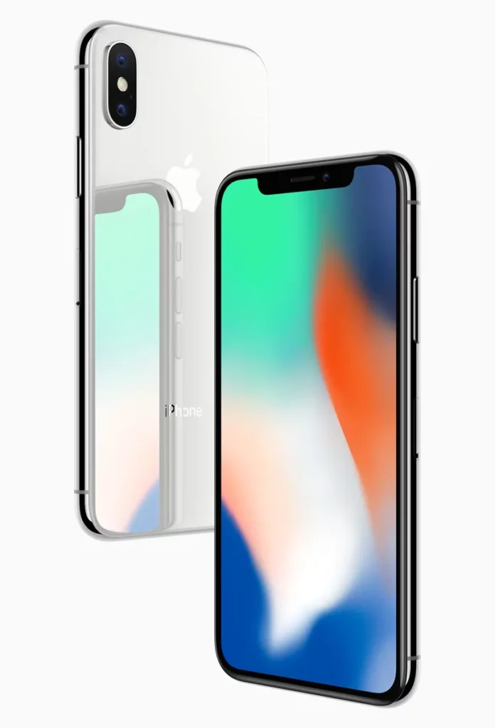 A product shot of a silver and white iPhone X from an angled perspective. The front screen displays a vibrant, abstract wallpaper with blue, green, and orange gradients, highlighting the phone's top notch, while the glossy white back and vertical dual-camera module are visible behind it.