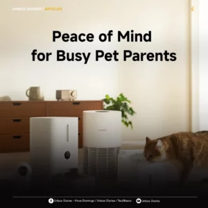 A promotional graphic featuring the Xiaomi smart pet product lineup in a warm living room with a ginger cat. The bold text "Peace of Mind for Busy Pet Parents" is prominent, with the "Unbox Diaries / Articles" header at the top and social media handles at the bottom.