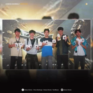 Unbox Diaries article graphic featuring the Webmasters Esports team members holding up realme prizes on stage after winning the RMC Season 10 Visayas Regionals.