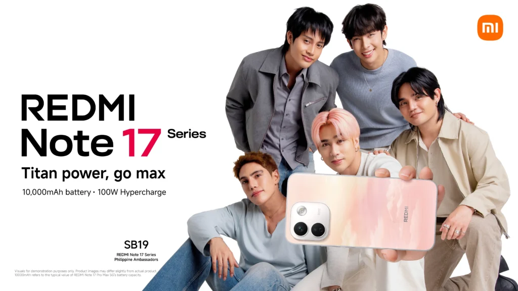 All five members of SB19 pose together in coordinated light-toned and grey casual outfits. Josh sits in the center with pink hair, holding up a REDMI Note 17 phone with a peach gradient back design. Text on the left reads "REDMI Note 17 Series: Titan power, go max," featuring key specs like a 10,000mAh battery and 100W Hypercharge, along with the SB19 logo and Xiaomi logo in the top right.