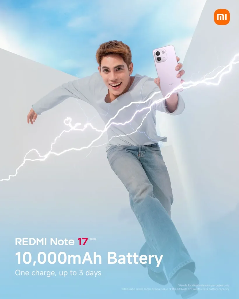 Stell from SB19 leaps excitedly toward the camera in a light long-sleeve shirt and jeans, holding a light purple REDMI Note 17 smartphone as graphic lightning bolts surround him. Text reads "REDMI Note 17 Series: 10,000mAh Battery - One charge, up to 3 days."