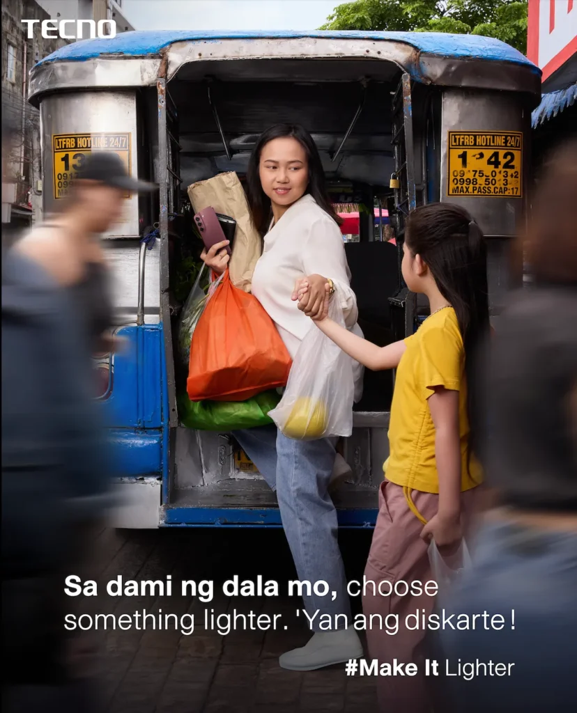 A woman carrying groceries and holding a smartphone steps off a traditional blue and silver Philippine jeepney while holding hands with a young girl in a yellow shirt. The scene includes blurred pedestrians in the foreground and text reading "Sa dami ng dala mo, choose something lighter. 'Yan ang diskarte! #Make It Lighter" along with TECNO branding.